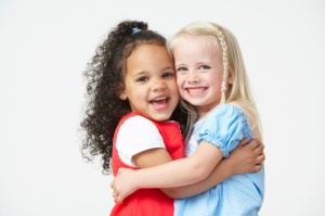 Two Pre School Girls Hugging One Another